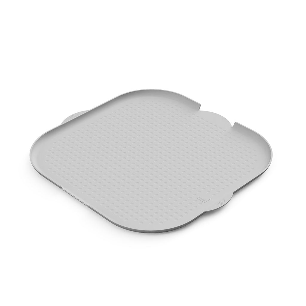 Katch Litter Mat in gray color with textured surface to trap cat litter