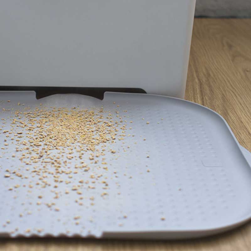 Close-up of Katch Litter Mat texture showing how it captures litter particles